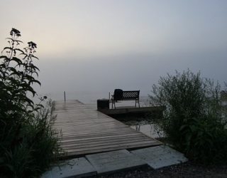 Peddelen bij zonsopgang, door de nevel