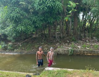 Locals in water in Weerawila